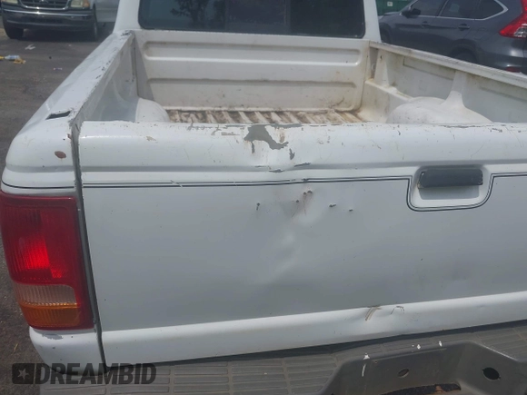 1996 Ford Ranger XL z VIN 1FTCR14A2TPB29154, wystawiony jako IAAI lot #42065099 z przebiegiem 250 809 mil mil oraz . Historia ofert i sprzedaży dostępna na DreamBid. Obrazek 19.