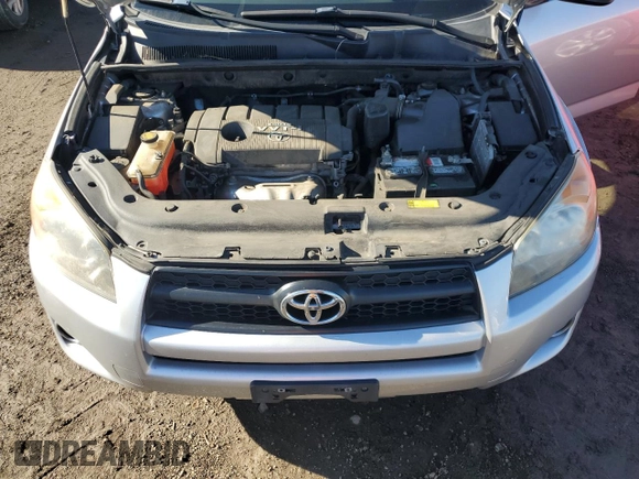 2011 Toyota RAV4 Sport z VIN JTMRF4DV5B5037697, wystawiony jako Copart lot #82259164 z przebiegiem 99 215 mil mil oraz Szkoda całkowita • Salvage title. Historia ofert i sprzedaży dostępna na DreamBid. Obrazek 13.