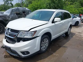 2019 Dodge Journey SE with VIN 3C4PDCBB6KT833777, listed as a IAAI auction lot 42411738 with 32,133 mi miles and . Bid and sale history available at DreamBid. Image 2.