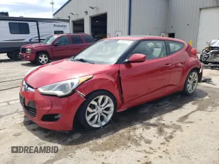 2013 Hyundai Veloster w/Black Int z VIN KMHTC6AD4DU092720, wystawiony jako Copart lot #58051295 z przebiegiem 118 833 mil mil oraz Szkoda całkowita • Salvage title. Historia ofert i sprzedaży dostępna na DreamBid. Obrazek 1.