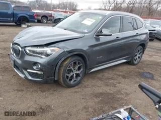 2017 BMW X1 xDrive28i with VIN WBXHT3C35H5F74213, listed as a IAAI auction lot 41589180 with 58,990 mi miles. Bid and sale history available at carsss.com. Image 16.