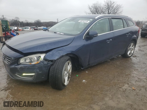 2015 Volvo V60 T5 Drive-E Premier z VIN YV140MEK9F1233763, wystawiony jako Copart lot #45242415 z przebiegiem 97 916 mil mil oraz Szkoda całkowita • Salvage title. Historia ofert i sprzedaży dostępna na DreamBid. Obrazek 1.