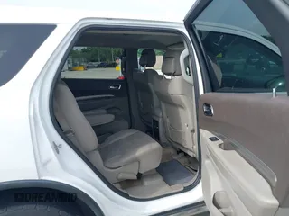 2013 Dodge Durango SXT with VIN 1C4RDHAG1DC669503, listed as a IAAI auction lot 42614210 with 103,482 mi miles and . Bid and sale history available at DreamBid. Image 8.