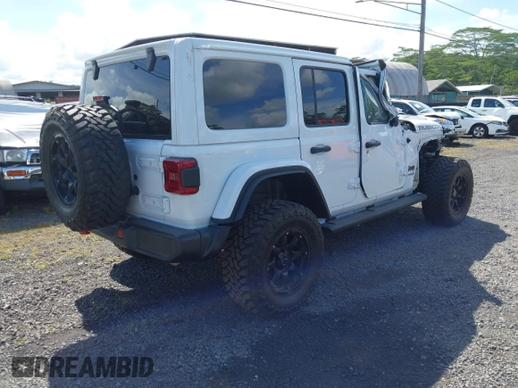 2022 Jeep Wrangler Unlimited Rubicon with VIN 1C4HJXFG8NW130156, listed as a IAAI auction lot 42004630 with 129,313 mi miles and . Bid and sale history available at DreamBid. Image 4.