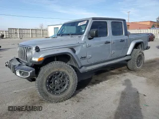 2021 Jeep Gladiator Sport S z VIN 1C6JJTAM1ML508266, wystawiony jako Copart lot #45349555 z przebiegiem 47 883 mil mil oraz Szkody całkowita. Historia ofert i sprzedaży dostępna na DreamBid. Obrazek 1.