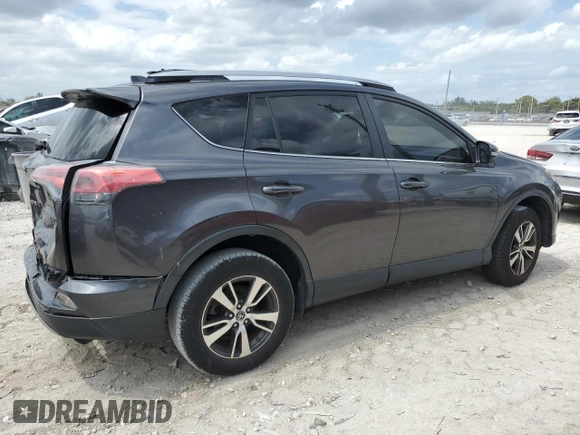 2018 Toyota RAV4 XLE with VIN JTMWFREV1JJ742694, listed as a Copart auction lot 51093695 with 74,502 mi miles and Salvage Title. Bid and sale history available at DreamBid. Image 3.