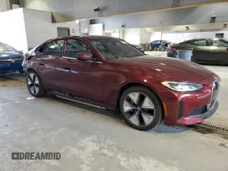 2023 BMW i4 eDrive35 with VIN WBY43AW08PFP74962, listed as a Copart auction lot 65729953 with 1,250 mi miles. Bid and sale history available at carsss.com. Image 4.