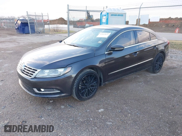 2015 Volkswagen CC Lux with VIN WVWRP7AN9FE819154, listed as a IAAI auction lot 41669832 with 151,142 mi miles. Bid and sale history available at carsss.com. Image 2.