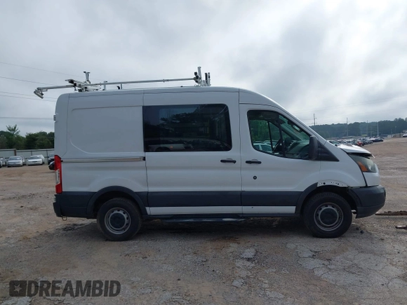 2015 Ford Transit Cargo with VIN 1FTNR1CM2FKB29029, listed as a IAAI auction lot 42286089 with 130,845 mi miles and . Bid and sale history available at DreamBid. Image 13.