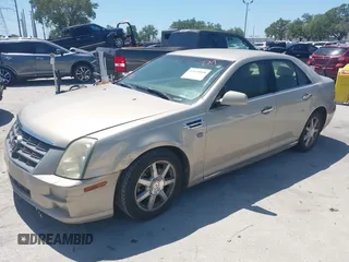 2008 Cadillac STS RWD with VIN 1G6DW67V780153199, listed as a IAAI auction lot 42058808 with 164,961 mi miles and . Bid and sale history available at DreamBid. Image 2.