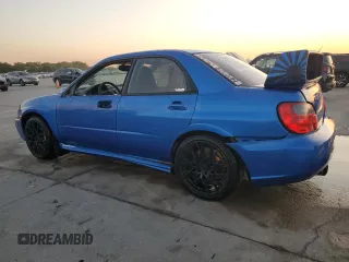 2005 Subaru Impreza Sedan (Natl) WRX STi w/Gold Wheels with VIN JF1GD70695L505952, listed as a Copart auction lot 76518304 with 173,385 mi miles and Salvage Title. Bid and sale history available at carsss.com. Image 2.