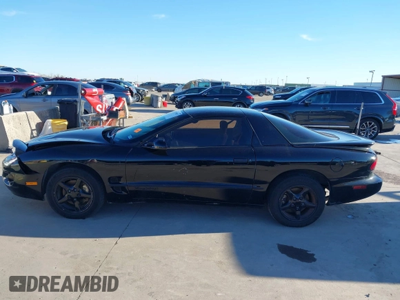 2002 Pontiac Firebird Firebird z VIN 2G2FS22K022109417, wystawiony jako IAAI lot #41199057 z przebiegiem 124 463 mil mil oraz . Historia ofert i sprzedaży dostępna na DreamBid. Obrazek 14.