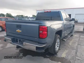 2015 Chevrolet Silverado 1500 LT with VIN 3GCUKREC8FG535021, listed as a IAAI auction lot 42154626 with 125,897 mi miles and . Bid and sale history available at DreamBid. Image 4.