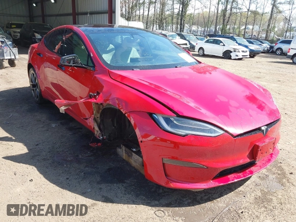 2021 Tesla Model S Long Range z VIN 5YJSA1E51MF436329, wystawiony jako IAAI lot #41918018 z przebiegiem 44 029 mil mil oraz . Historia ofert i sprzedaży dostępna na DreamBid. Obrazek 1.