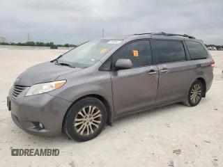 2014 Toyota Sienna XLE with VIN 5TDYK3DC2ES510647, listed as a Copart auction lot 54488845 with 216,091 mi miles and Salvage Title. Bid and sale history available at DreamBid. Image 1.