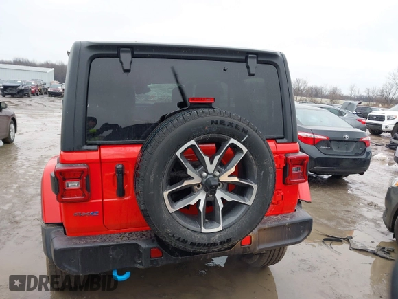2024 Jeep Wrangler Willys z VIN 1C4RJXN67RW227593, wystawiony jako IAAI lot #41519596 z przebiegiem 7 851 mil mil oraz . Historia ofert i sprzedaży dostępna na DreamBid. Obrazek 16.