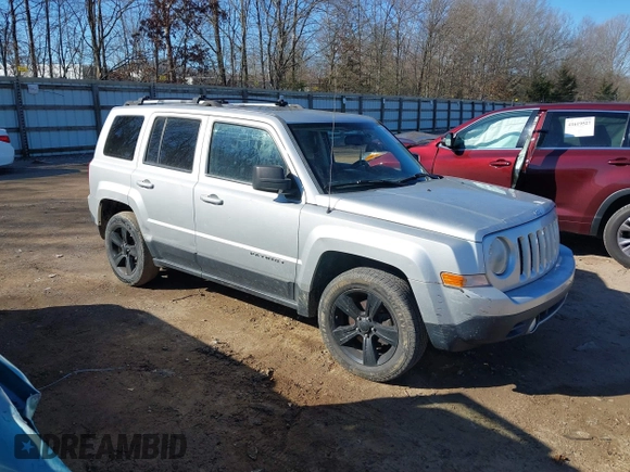 2013 Jeep Patriot Latitude with VIN 1C4NJPFB0DD192541, listed as a IAAI auction lot 41632796 with 121,823 mi miles. Bid and sale history available at carsss.com. Image 1.