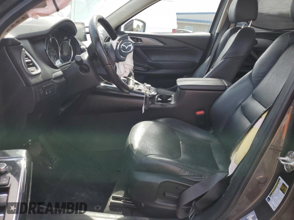 2019 Mazda CX-9 Touring with VIN JM3TCBCY0K0309947, listed as a Copart auction lot 56897815 with 87,517 mi miles and Salvage title. Bid and sale history available at DreamBid. Image 7.