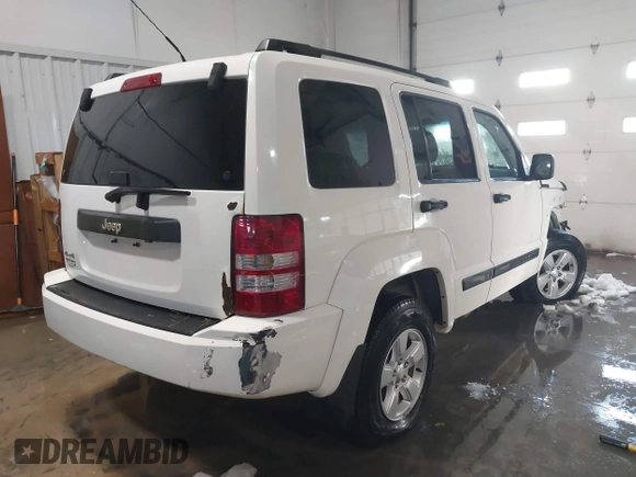 2010 Jeep Liberty Sport with VIN 1J4PN2GK4AW182488, listed as a IAAI auction lot 41312146 with 217,617 mi miles. Bid and sale history available at carsss.com. Image 4.