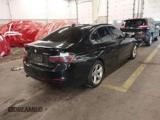 2014 BMW 3 Series 328d xDrive with VIN WBA3D5C58EKX95300, listed as a IAAI auction lot 41539957 with 133,382 mi miles. Bid and sale history available at carsss.com. Image 4.