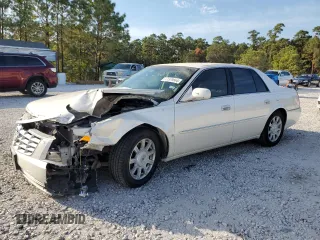 2009 Cadillac DTS 1SC z VIN 1G6KD57Y89U148413, wystawiony jako Copart lot #77379564 z przebiegiem 86 173 mil mil oraz Szkoda całkowita • Salvage title. Historia ofert i sprzedaży dostępna na DreamBid. Obrazek 1.