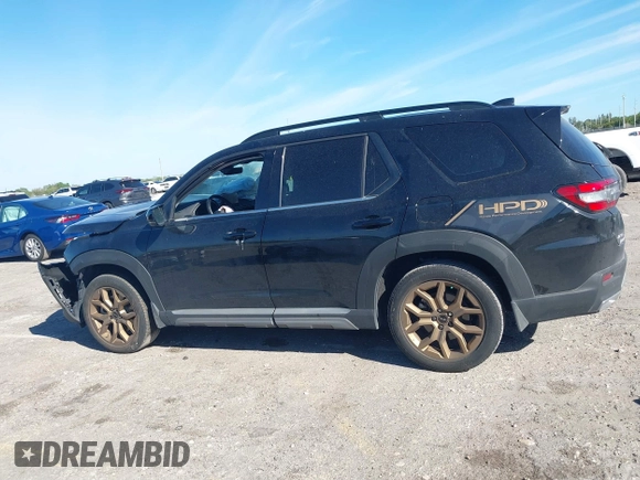 2023 Honda Pilot Elite with VIN 5FNYG1H87PB045057, listed as a IAAI auction lot 41748553 with 44,329 mi miles and . Bid and sale history available at DreamBid. Image 15.