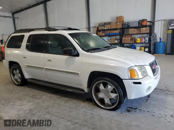 2003 GMC Envoy SLT with VIN 1GKES16S436240107, listed as a Copart auction lot 52327005 with 237,745 mi miles and Clean Title. Bid and sale history available at carsss.com. Image 4.