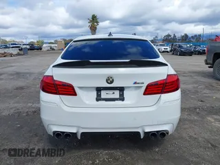 2013 BMW M5 with VIN WBSFV9C56DC772961, listed as a IAAI auction lot 41765457 with 104,568 mi miles. Bid and sale history available at carsss.com. Image 16.