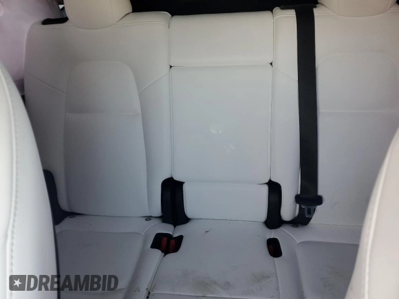 2023 Tesla Model Y Long Range z VIN 7SAYGAEE1PF810888, wystawiony jako Copart lot #88991735 z przebiegiem Nie podano mil oraz Nie do naprawy • Non repairable. Historia ofert i sprzedaży dostępna na DreamBid. Obrazek 12.