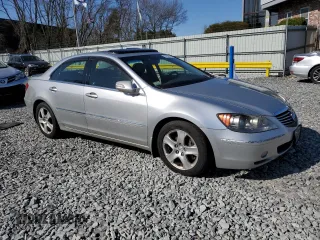 2005 Acura RL z VIN JH4KB165X5C014519, wystawiony jako Copart lot #63648925 z przebiegiem 215 443 mil mil oraz Nie do naprawy • Non repairable. Historia ofert i sprzedaży dostępna na DreamBid. Obrazek 4.