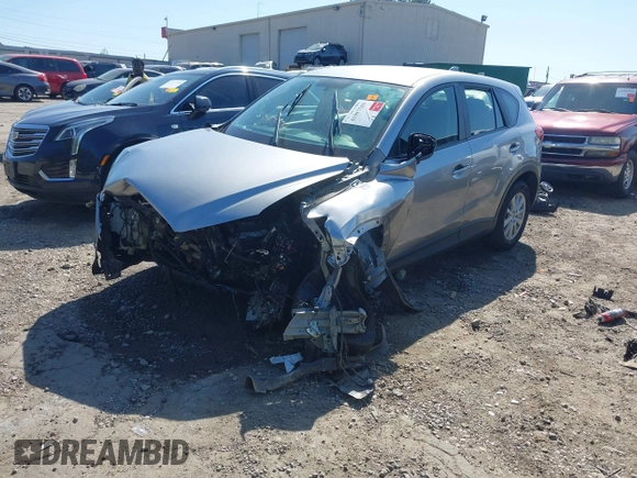2013 Mazda CX-5 Sport z VIN JM3KE2BE9D0132928, wystawiony jako IAAI lot #41997589 z przebiegiem Nie podano mil oraz . Historia ofert i sprzedaży dostępna na DreamBid. Obrazek 16.