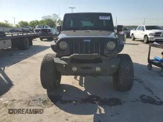 2013 Jeep Wrangler Unlimited Freedom z VIN 1C4BJWDG0DL513902, wystawiony jako Copart lot #52045975 z przebiegiem 166 827 mil mil oraz Szkoda całkowita • Salvage title. Historia ofert i sprzedaży dostępna na DreamBid. Obrazek 5.