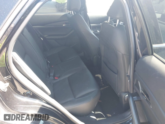 2023 Mazda CX-30 S Carbon Edition with VIN 3MVDMBCM1PM509987, listed as a IAAI auction lot 42060833 with 14,140 mi miles and . Bid and sale history available at DreamBid. Image 8.