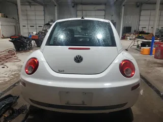 2009 Volkswagen New Beetle Coupe S with VIN 3VWRG31C29M516526, listed as a Copart auction lot 84535234 with 57,870 mi miles and Salvage Title. Bid and sale history available at carsss.com. Image 6.