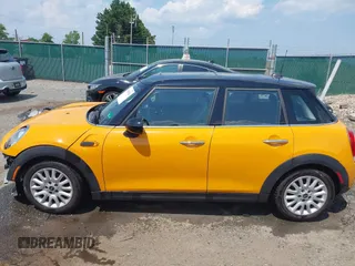 2016 MINI Hardtop 4 Door z VIN WMWXU1C53G2D08424, wystawiony jako IAAI lot #42509304 z przebiegiem 97 729 mil mil oraz . Historia ofert i sprzedaży dostępna na DreamBid. Obrazek 15.