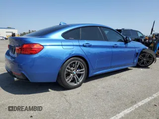 2015 BMW 4 Series 435i with VIN WBA4B1C59FD955421, listed as a Copart auction lot 56347345 with 42,922 mi miles and Salvage title. Bid and sale history available at DreamBid. Image 3.