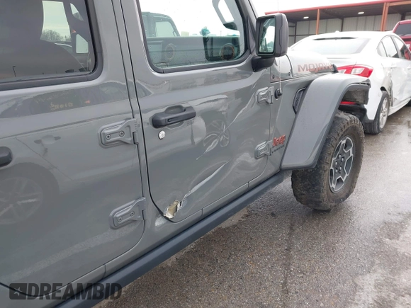 2022 Jeep Gladiator Mojave z VIN 1C6JJTEG8NL130971, wystawiony jako IAAI lot #41163074 z przebiegiem 47 142 mil mil oraz . Historia ofert i sprzedaży dostępna na DreamBid. Obrazek 20.
