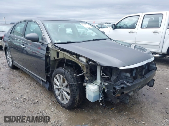 2012 Toyota Avalon with VIN 4T1BK3DB6CU459249, listed as a IAAI auction lot 41802571 with 147,955 mi miles. Bid and sale history available at carsss.com. Image 1.