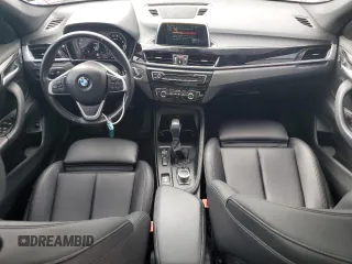 2019 BMW X1 xDrive28i with VIN WBXHT3C52K3H34021, listed as a Copart auction lot 64032535 with 30,752 mi miles and Salvage title. Bid and sale history available at DreamBid. Image 8.