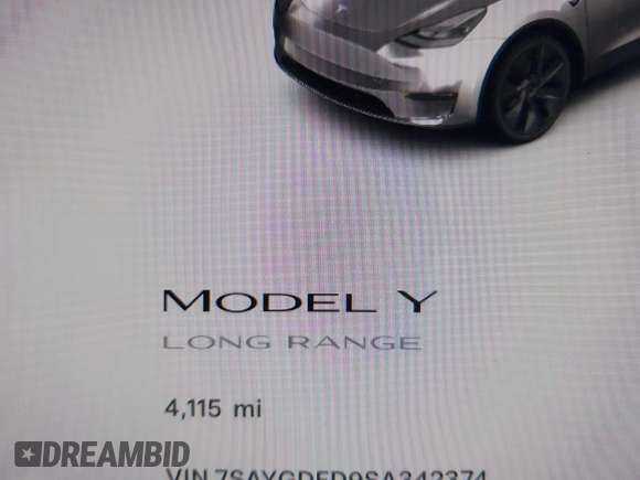 2025 Tesla Model Y Long Range with VIN 7SAYGDED9SA342374, listed as a IAAI auction lot 41663085 with 4,115 mi miles and . Bid and sale history available at DreamBid. Image 14.