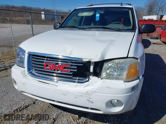 2007 GMC Envoy SLE with VIN 1GKDS13S772142847, listed as a IAAI auction lot 41605904 with 131,564 mi miles. Bid and sale history available at carsss.com. Image 6.