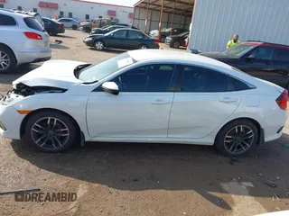 2020 Honda Civic LX z VIN 2HGFC2F68LH565560, wystawiony jako IAAI lot #41517853 z przebiegiem 96 832 mil mil oraz . Historia ofert i sprzedaży dostępna na DreamBid. Obrazek 14.