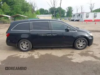 2011 Honda Odyssey EX-L with VIN 5FNRL5H68BB071178, listed as a IAAI auction lot 42286324 with 213,847 mi miles and . Bid and sale history available at DreamBid. Image 13.