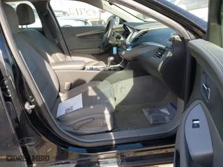 2016 Chevrolet Impala LS with VIN 2G11X5SAXG9132050, listed as a IAAI auction lot 41440712 with 156,940 mi miles. Bid and sale history available at carsss.com. Image 5.