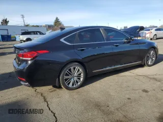 2018 Genesis G80 3.8L z VIN KMHGN4JE1JU265260, wystawiony jako Copart lot #87121164 z przebiegiem 90 611 mil mil oraz Szkoda całkowita • Salvage title. Historia ofert i sprzedaży dostępna na DreamBid. Obrazek 3.