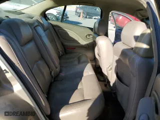 2005 Pontiac Bonneville SE with VIN 1G2HX52K35U240318, listed as a Copart auction lot 77627804 with 143,707 mi miles and Salvage Title. Bid and sale history available at carsss.com. Image 10.