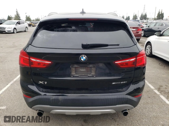 2018 BMW X1 sDrive28i with VIN WBXHU7C32J5L06825, listed as a Copart auction lot 49403143 with 93,723 mi miles. Bid and sale history available at carsss.com. Image 6.
