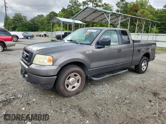 2005 Ford F-150 STX with VIN 1FTRX12W55FB32573, listed as a Copart auction lot 59602715 with 238,701 mi miles and Salvage title. Bid and sale history available at DreamBid. Image 1.