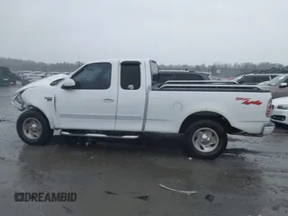 1999 Ford F-150 XL with VIN 1FTRX18L6XNB48352, listed as a IAAI auction lot 41717057 with 171,654 mi miles. Bid and sale history available at carsss.com. Image 15.