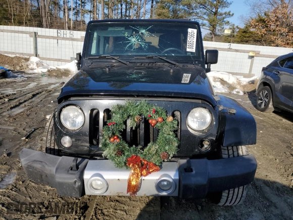 2015 Jeep Wrangler Unlimited Sahara with VIN 1C4BJWEG3FL530114, listed as a Copart auction lot 88851565 with 156,669 mi miles and Salvage Title. Bid and sale history available at carsss.com. Image 5.